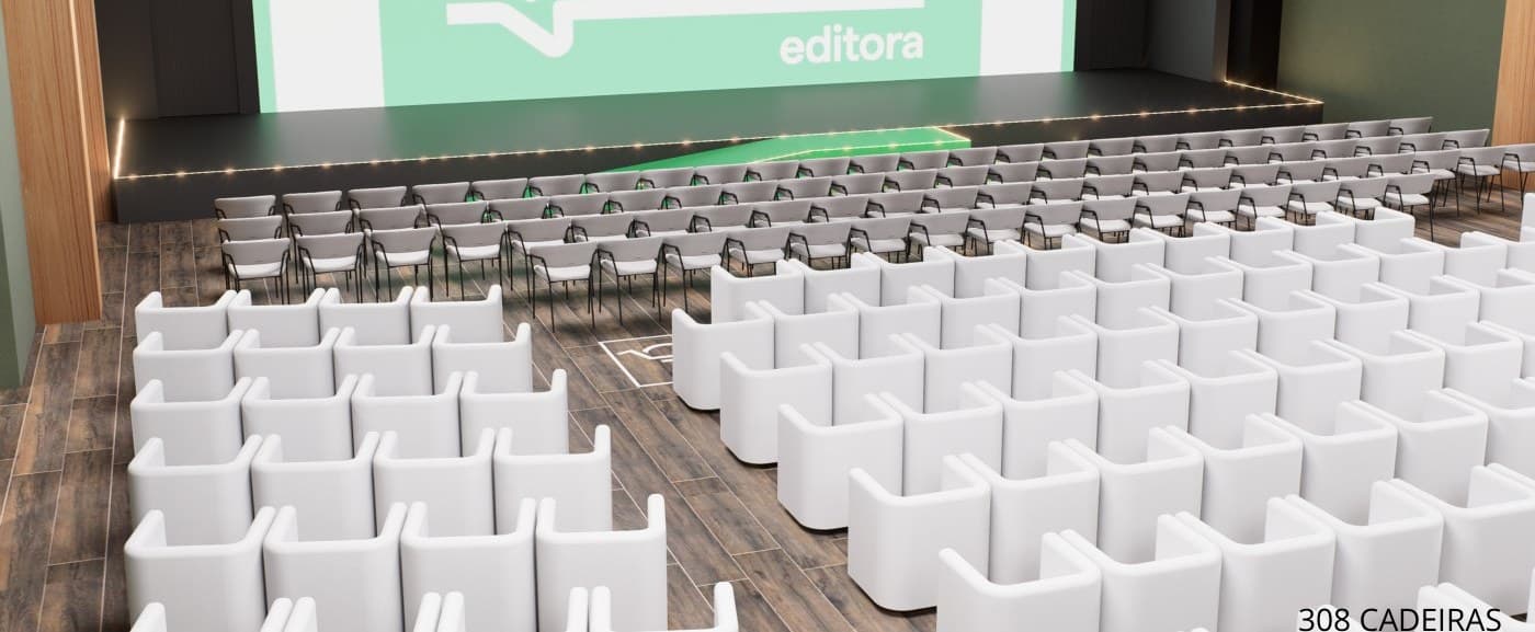 Plenária Aprender montada para a Imersão 2026: fileiras de poltronas voltadas para o palco iluminado em luz quente.